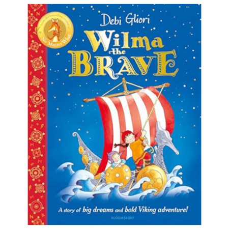 Book cover of Wilma the Brave shows Wilma on a Viking ship with a striped sail, blue waves, starry sky, and dragon-shaped prow.