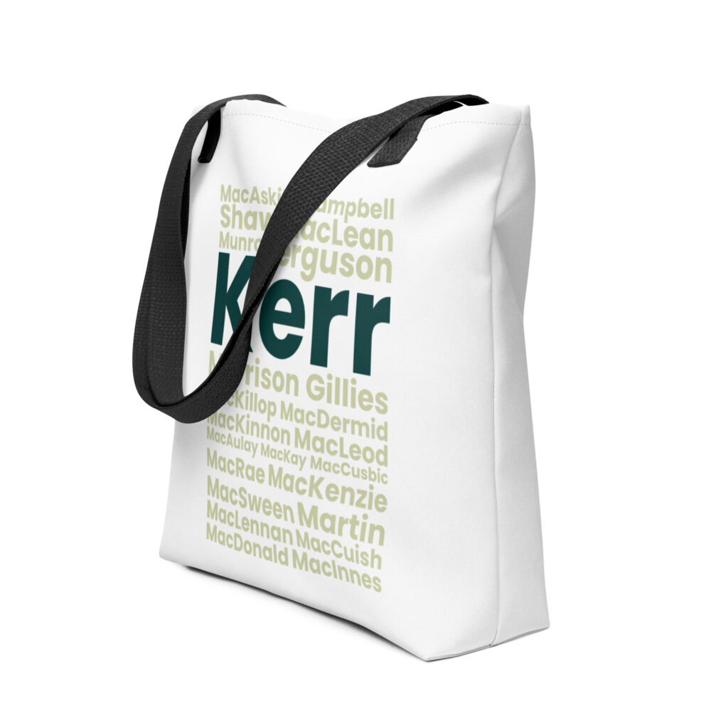 Certainly. Here is a factual description of the tote bag, without ascribing feelings: The Tote bag features prominent Kerr lettering in bold green across the front. Surrounding this principal name are smaller Scottish surnames, also in shades of green. The text is displayed on a white fabric background, and the bag includes black straps for carrying.